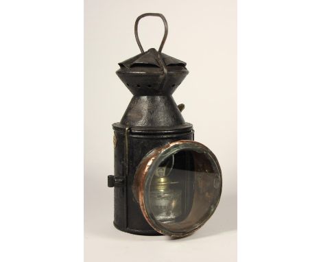 A NER 3 aspect hand lamp with brass NER badge- complete with glasses and NER burner