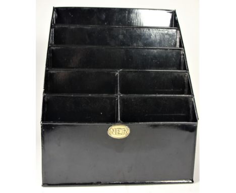A metal N.E.R leaflet rack with small brass N.E.R plaque, 33x27 cm