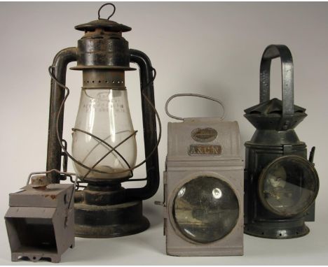 A dark green 3 aspect no glasses WD 1944 handlamp, complete with burner, together with an American Storm canteen, a small han