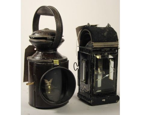 A small 3 aspect LNER hand lamp with burner together with a beveled glass candle lamp with spare candles stored in internal t