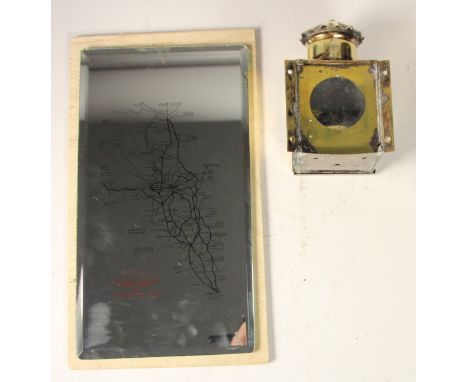 A small brass ships compass binnacle lamp with burner, and a small BR carriage beveled mirror showing route map London Midlan