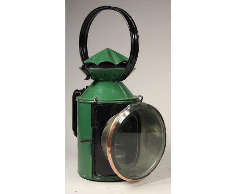A LNER green four aspect hand lamp, complete with burner and glasses 
