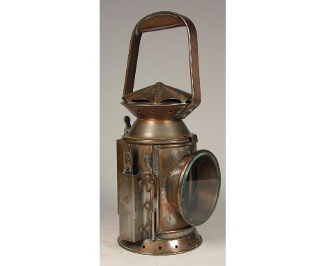 A WD 1954 brass 3 aspect hand lamp, body stamped with arrow and date, complete with burner and glasses 