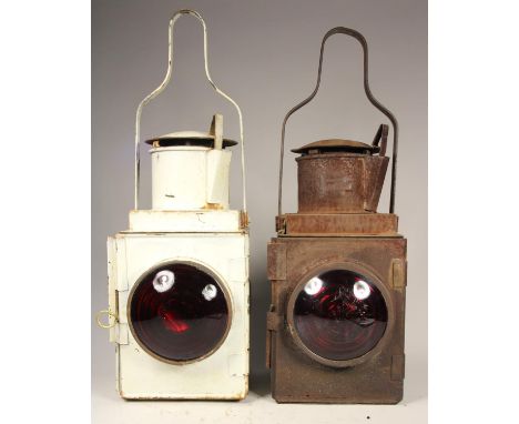 A white B.R (m) tail lamp with burner, together with unmarked tail lamp (rusty) (2)