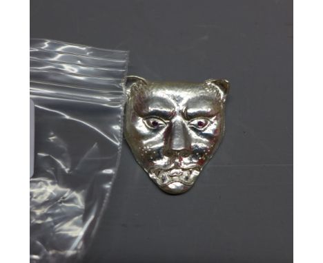 Silver panther head pendant, set with ruby eyes 