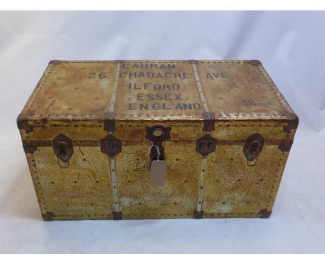 An early 20th century steamer trunk with fitted interior.