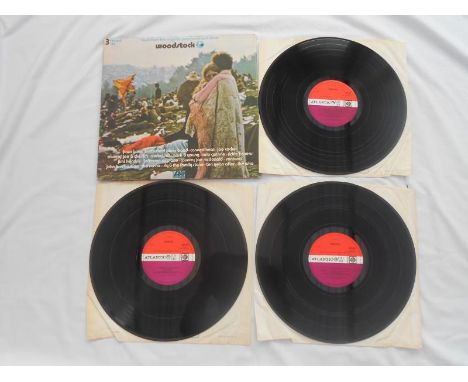 Woodstock UK Triple LP 1st press records Atlantic 2402-0902 1970 EX+ All of the vinyls are in excellent+ condition and all ha