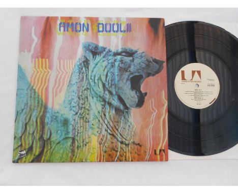 Amon Duul 11 ? Wolf City ? Gernman 1st press UAG 29406 A-1 and B-1 EX The vinyl is in excellent condition and has a high glos