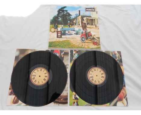 Original Oasis  Be here now Creation CRELP 219 UK 1st press double LP N/EX Original release Mike the exchange.The two vinyls 