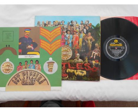 The Beatles Sgt Peppers UK 1st press LP record PCS 7027 XEX 637-1 and XEX 638-1 EX The vinyl is in excellent condition with a