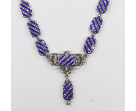 A stylish sterling, paste and blue enamel set drop pendant necklace, overall 43cm.