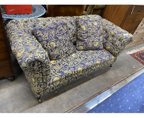 A Victorian upholstered drop-arm Chesterfield settee, width 170cm, depth 84cm, height 72cm