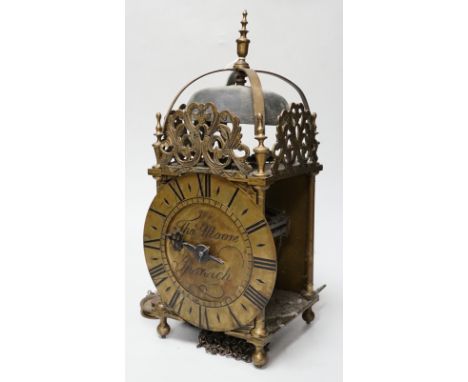 An English brass lantern clock with four branch finial decoration signed Tho Moore of Ipswich, 36cm tall