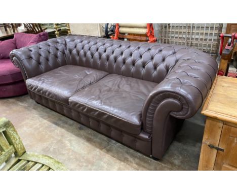 A Heals buttoned brown leather Chesterfield settee, length 234cm, depth 100cm, height 76cm