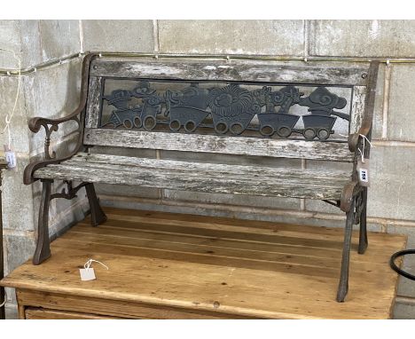 A child's slatted garden bench