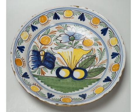 An 18th century Delftware charger, 35cm diameter