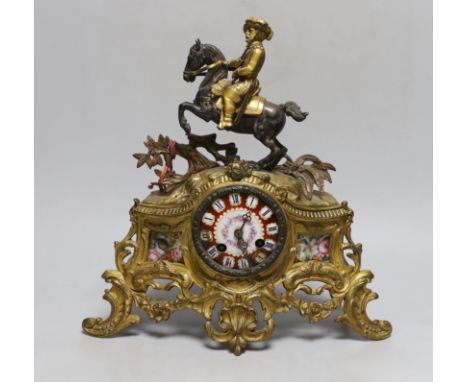 A 19th century French gilt metal ‘cavalier’ mantel clock, 33cm tall