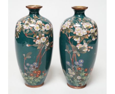 A small pair of Japanese silver wire cloisonné enamel green ground vases, early 20th century, 14cm