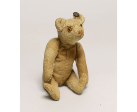 A Steiff rattle bear, with button, c.1920's, 5in., some hair loss