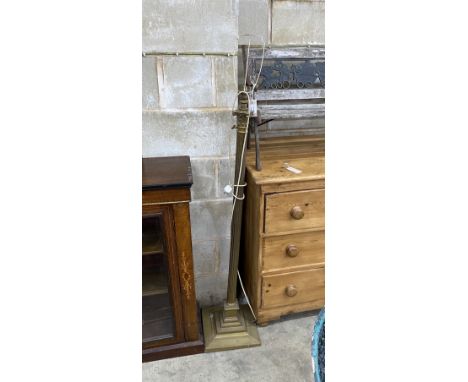 An Edwardian brass Corinthian column telescopic lamp standard