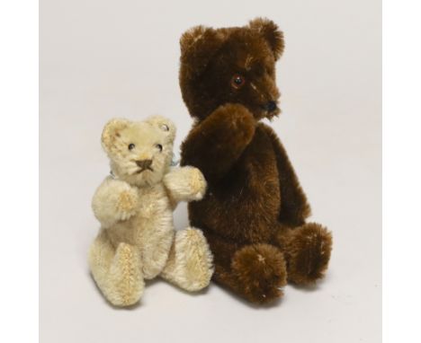 A Schuco Yes/No brown mohair, 1950's, 5in., excellent condition, and a 1950's Steiff bear with button, 3in., excellent condit