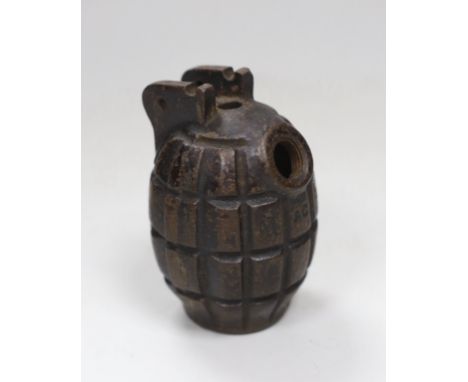 A World War II army hand grenade shell, 9cm high