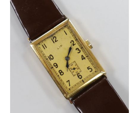 A French yellow metal (18ct poincon mark) LIP T18 'Churchill' manual wind rectangular Arabic dial wrist watch, with subsidiar