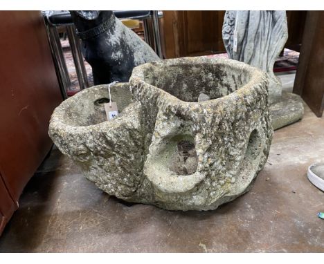 A reconstituted stone faux trunk section garden planter, height 30cm