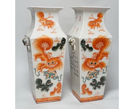 A pair of Chinese enamelled porcelain ‘fish’ square baluster vases, inscribed, 42cm high