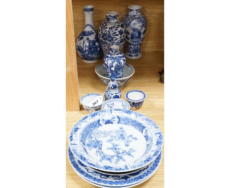 A quantity of blue and white Chinese porcelain dishes and vessels, 18th century and later, tallest 22.5cm