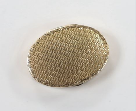 An Asprey part engine turned 9ct oval pill box, 28mm, 7.9 grams.