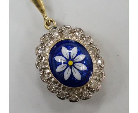 A modern 18ct gold, enamel and illusion set diamond chip oval cluster pendant, overall 30mm, gross weight 5.9 grams.