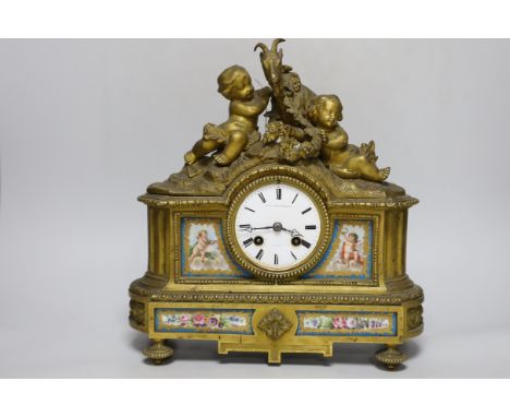 A 19th century French ormolu and Sevres style porcelain mounted mantel clock, 32cm high