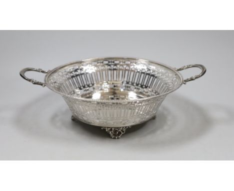 A George V pierced silver two handled bowl, William Hutton &amp; Sons, Sheffield, 1927, 25.2 cm over handles, 9.8oz.