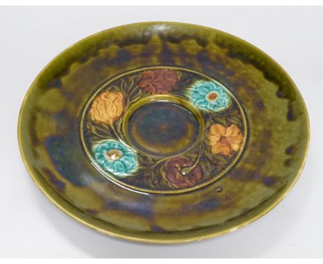 Christopher Dresser for Linthorpe, an art pottery, Aesthetic Movement plate, majolica glazed relief design with a central wre