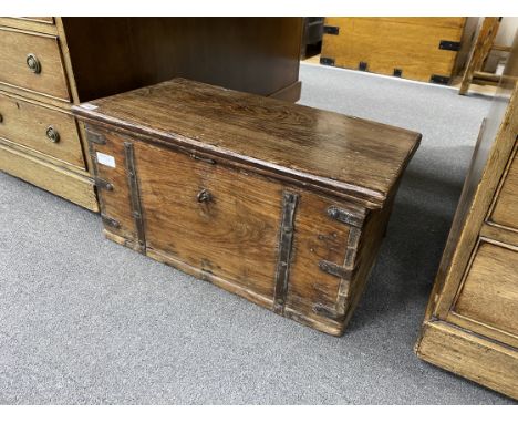 A small iron bound hardwood trunk, width 64cm, depth 34cm, height 34cm