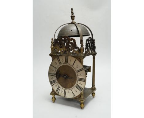 An 18th century and later brass lantern clock, 38cm