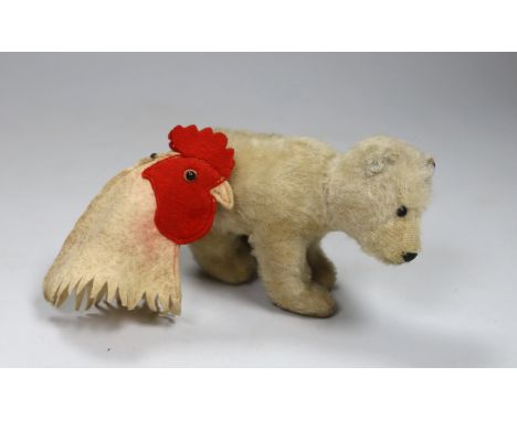 A Steiff hen egg cosy, c.1910, with button, 3in., and a 1950's Polar bear, button, good condition