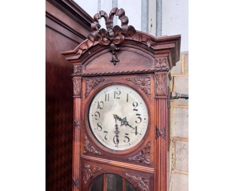 An early 20th century French carved walnut thirty hour longcase clock, height 224cm