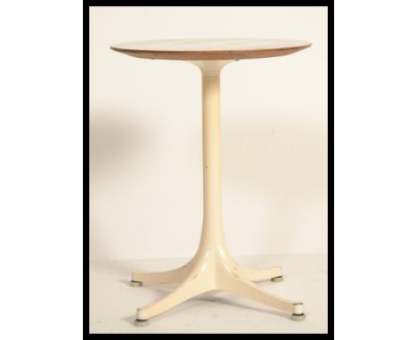 A mid century metal and formica lamp table in the manner of Eero Saarinen. Four pronged base with cylindrical column having w