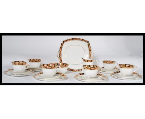 A vintage 20th century Royal Albert tea service in an Imari pattern. Consisting of six cups , saucers and side plates with cr