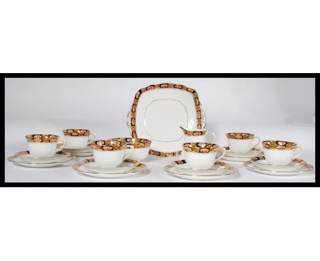 A vintage 20th century Royal Albert tea service in an Imari pattern. Consisting of six cups , saucers and side plates with cr