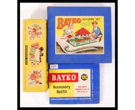 An original Pelham Puppets boxed puppet of a Dutch lady together with Bayko building set no. 1 and a Bayko accessory outfit s