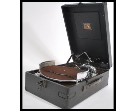 A vintage 20th Century Edwardian HMV His Masters Voice portable picnic gramophone Model 102 dating from 1930's with extra dis