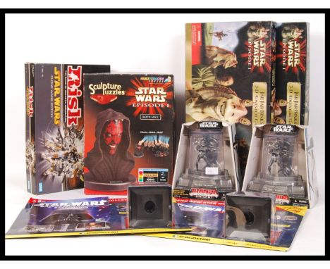 An assorted collection of Star Wars merchandise to include a Darth Maul 3D Sculpture Puzzle , 2x Diecast Clone Trooper figure