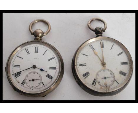 Two silver pocket watches to an example with white enamel face Roman numeral chapter ring and gilt faceted hands having subsi