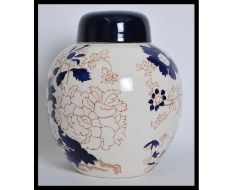 An early 20th century Mason's / Mason ceramic lidded ginger jar in the Mandarin pattern having painted Cobalt details and cob