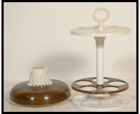 A vintage / retro 20th Century formed plastic circular two tiered drinks station / trolley,in the manner of&nbsp;Kartell / Ca