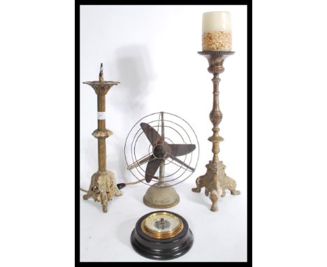 A collection of vintage and antique items to include a Marelli desk fan, barometer, a 19th Century ecclesiastical brass candl