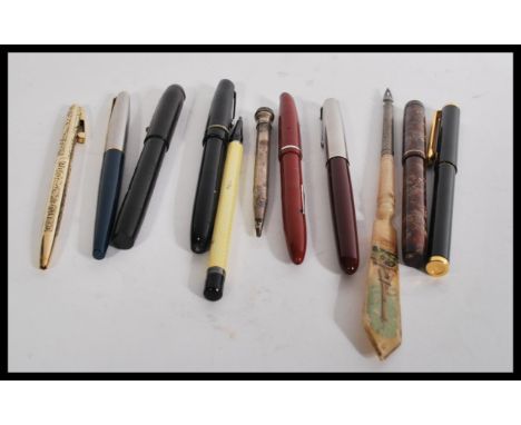 A collection of vintage pens to include Valentine 14k gold nip , Sheaffer 12ct gold filled , Osmoriod , Parker , French Stanh